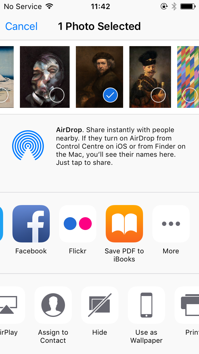 How can I hide photos on my iPhone?