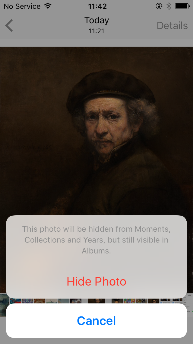 How can I hide photos on my iPhone?