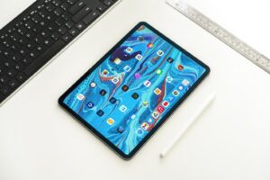 black ipad on white table